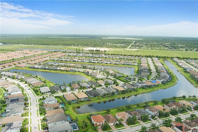 2042 Tamarron Ln, Naples, FL 34120 - aerial overview of property's location featuring nearby suburban area and a nearby body of water