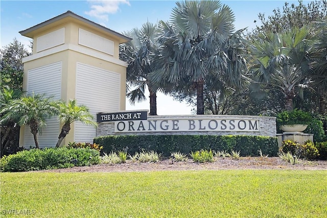 2042 Tamarron Ln, Naples, FL 34120 - community sign with a lawn