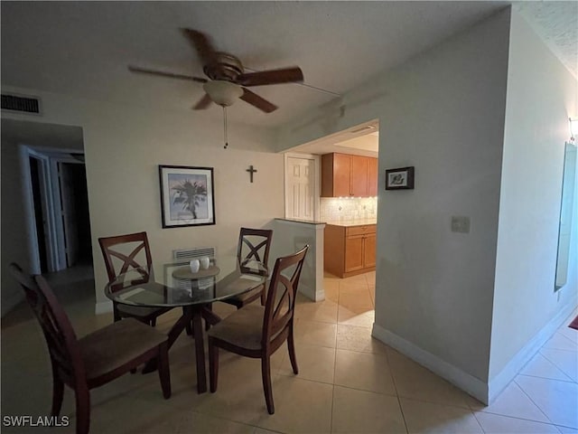 1414 SE 46th St Unit 1C, Cape Coral, FL 33904 - dining room with a ceiling fan and light tile patterned flooring
