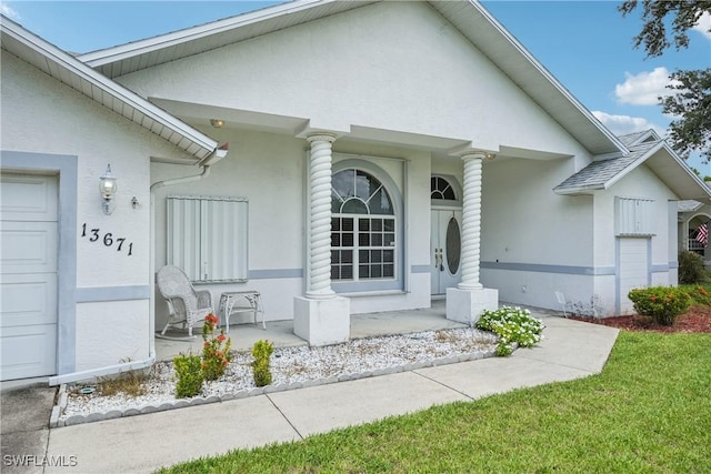 13671 Willow Bridge Dr, North Fort Myers, FL 33903 - entrance to property with a porch and stucco siding