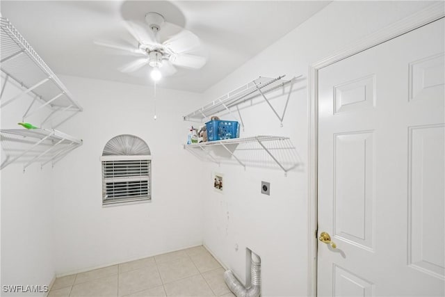 13671 Willow Bridge Dr, North Fort Myers, FL 33903 - laundry room with electric dryer hookup, hookup for a washing machine, a ceiling fan, and light tile patterned floors