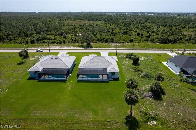 221 Rotonda Blvd S, Rotonda West, FL 33947 - view of subject property with a forest