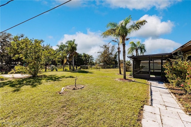 13611 Marquette Blvd, Fort Myers, FL 33905 - view of grassy yard with a sunroom
