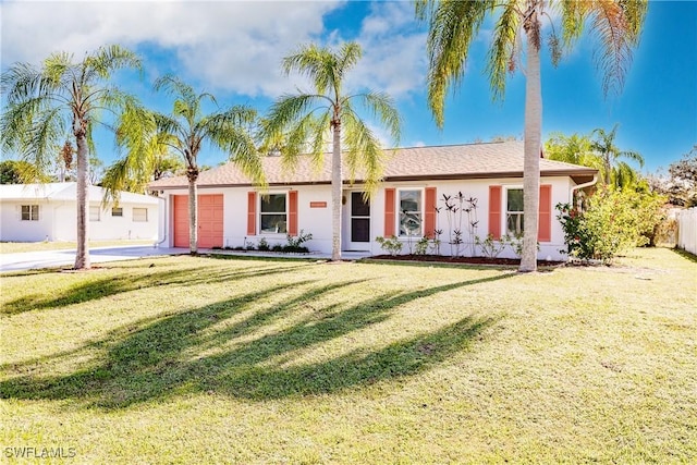 13611 Marquette Blvd, Fort Myers, FL 33905 - ranch-style house with an attached garage and stucco siding
