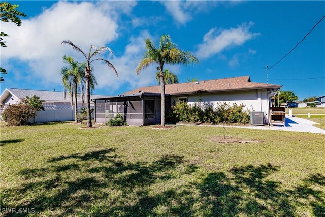 13611 Marquette Blvd, Fort Myers, FL 33905 - rear view of property with a sunroom