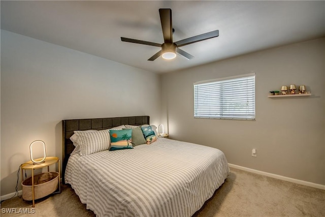 917 SW 23rd St, Cape Coral, FL 33991 - bedroom with carpet floors and ceiling fan