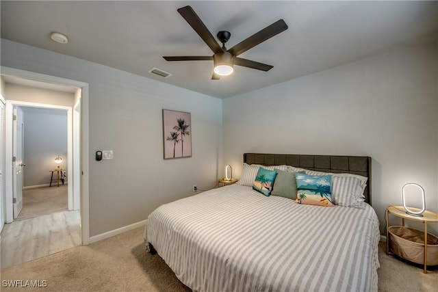 917 SW 23rd St, Cape Coral, FL 33991 - bedroom featuring light colored carpet and a ceiling fan