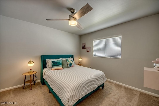 917 SW 23rd St, Cape Coral, FL 33991 - bedroom featuring light carpet and a ceiling fan