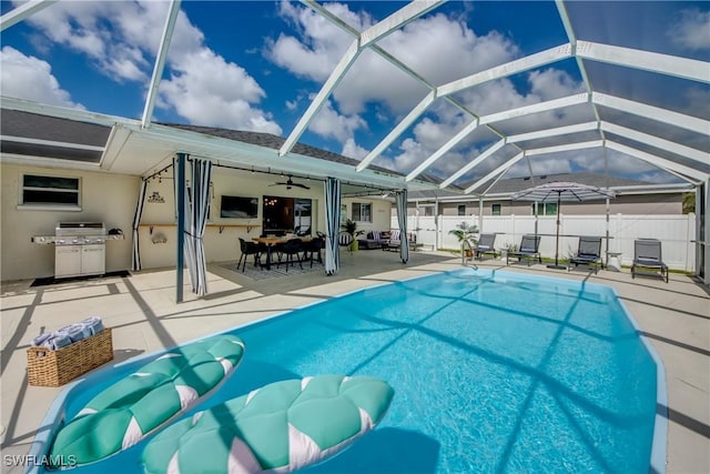 917 SW 23rd St, Cape Coral, FL 33991 - view of swimming pool featuring a patio, ceiling fan, a lanai, and a grill