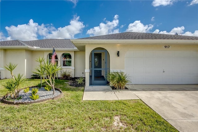 917 SW 23rd St, Cape Coral, FL 33991 - ranch-style house with concrete driveway, a garage, a front lawn, and stucco siding