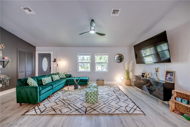 917 SW 23rd St, Cape Coral, FL 33991 - living room with wood finished floors, a ceiling fan, and vaulted ceiling