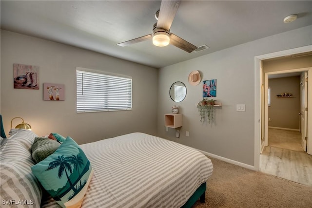 917 SW 23rd St, Cape Coral, FL 33991 - bedroom featuring light carpet and ceiling fan