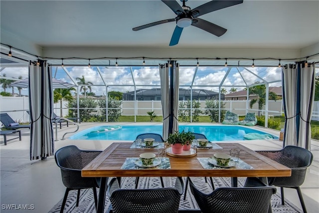 917 SW 23rd St, Cape Coral, FL 33991 - view of swimming pool with a fenced backyard, a patio, and glass enclosure