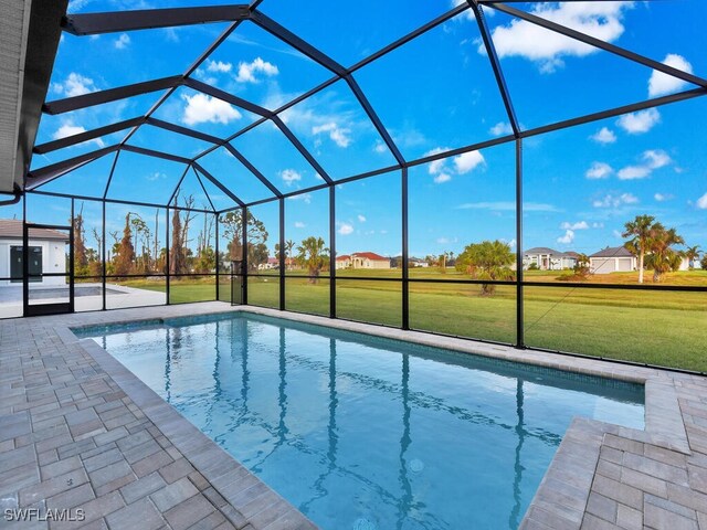 193 Rotonda Blvd S, Rotonda West, FL 33947 - swimming pool with a lawn, a lanai, and a patio area