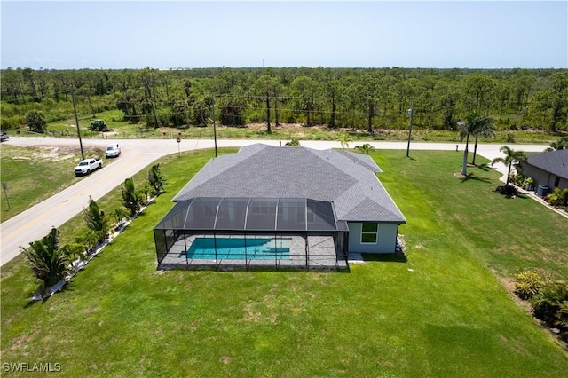 291 Rotonda Blvd S, Rotonda West, FL 33947 - view of subject property featuring a heavily wooded area and a pool
