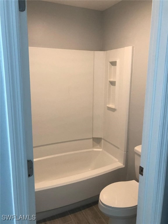 2929 Winkler Ave Unit 1008, Fort Myers, FL 33916 - full bathroom with bathing tub / shower combination and wood finished floors