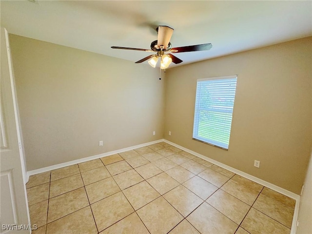 4916 7th St W, Lehigh Acres, FL 33971 - empty room with a ceiling fan and light tile patterned floors
