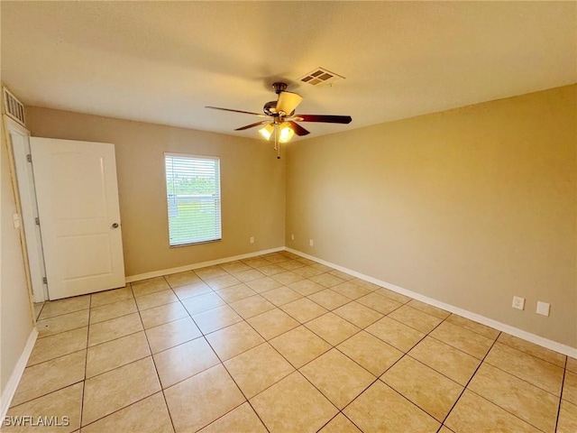 4916 7th St W, Lehigh Acres, FL 33971 - spare room featuring ceiling fan and light tile patterned floors