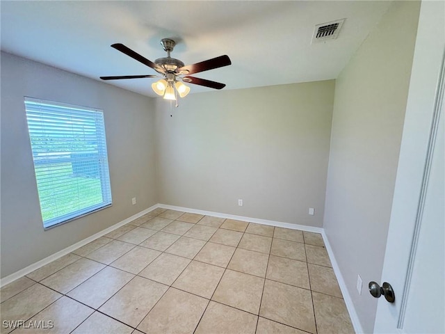 4916 7th St W, Lehigh Acres, FL 33971 - empty room with ceiling fan and light tile patterned floors