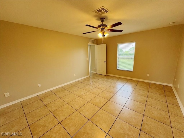 4916 7th St W, Lehigh Acres, FL 33971 - empty room with ceiling fan and light tile patterned floors