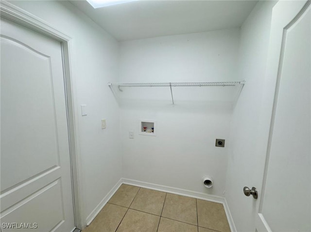 4916 7th St W, Lehigh Acres, FL 33971 - laundry area with hookup for a washing machine, electric dryer hookup, and light tile patterned floors