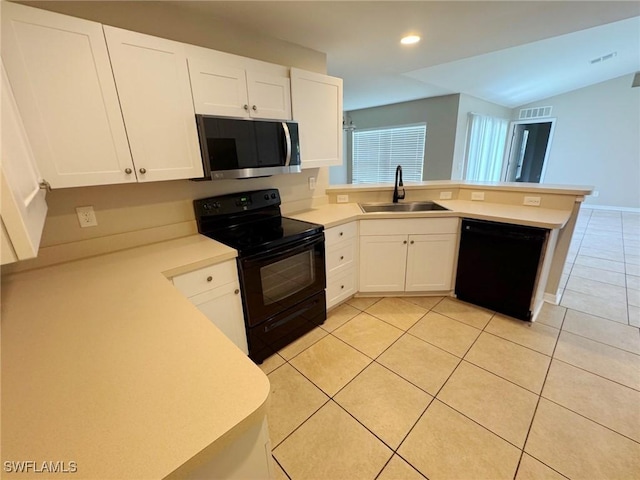 4916 7th St W, Lehigh Acres, FL 33971 - kitchen featuring black appliances, a peninsula, light tile patterned flooring, white cabinets, and recessed lighting