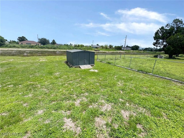 4916 7th St W, Lehigh Acres, FL 33971 - view of yard with a storage shed and a view of countryside