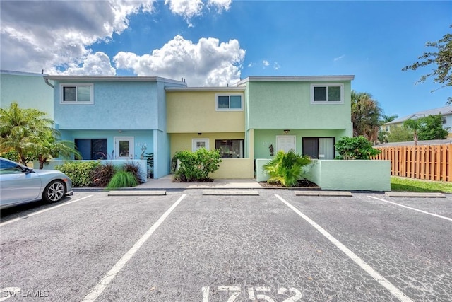 1752 Stickney Point Rd Unit 102, Sarasota, FL 34231 - view of front facade with uncovered parking and stucco siding