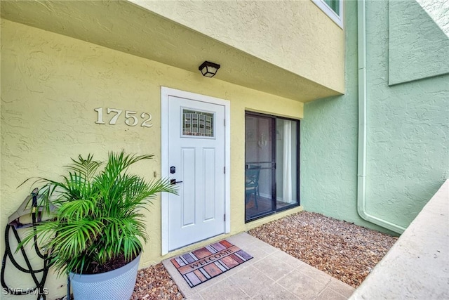 1752 Stickney Point Rd Unit 102, Sarasota, FL 34231 - entrance to property with stucco siding