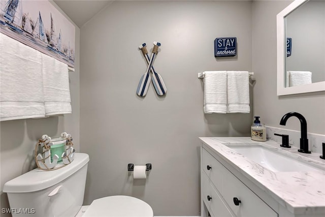 1752 Stickney Point Rd Unit 102, Sarasota, FL 34231 - half bathroom with toilet and vanity