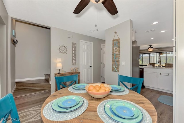 1752 Stickney Point Rd Unit 102, Sarasota, FL 34231 - dining area with ceiling fan, wood finished floors, and recessed lighting
