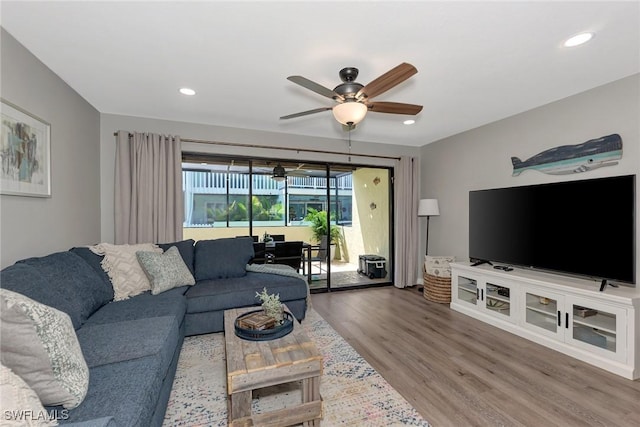 1752 Stickney Point Rd Unit 102, Sarasota, FL 34231 - living area with a ceiling fan, wood finished floors, and recessed lighting