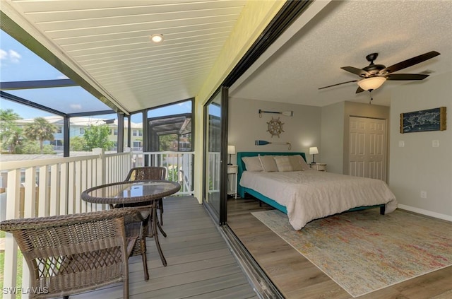 1752 Stickney Point Rd Unit 102, Sarasota, FL 34231 - bedroom featuring wood finished floors and a closet