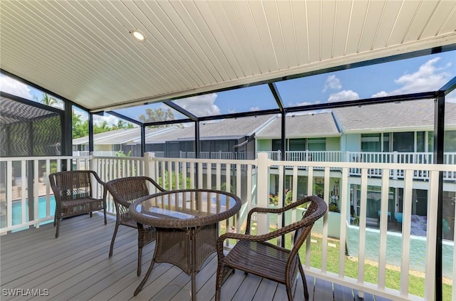 1752 Stickney Point Rd Unit 102, Sarasota, FL 34231 - view of sunroom / solarium