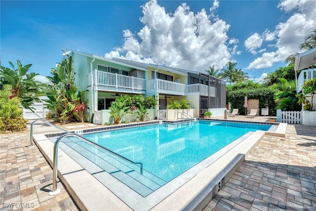 1752 Stickney Point Rd Unit 102, Sarasota, FL 34231 - community pool featuring a patio