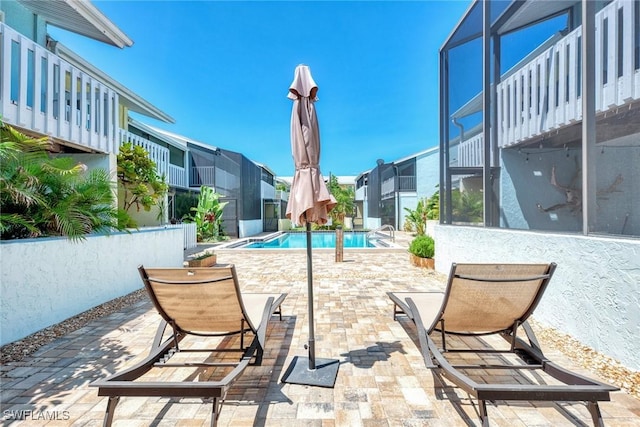 1752 Stickney Point Rd Unit 102, Sarasota, FL 34231 - view of pool with a patio area