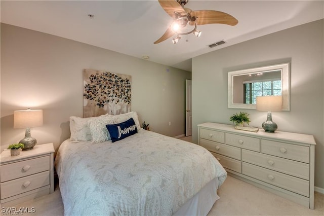 9470 Ivy Brook Run Unit 803, Fort Myers, FL 33913 - bedroom featuring light carpet and a ceiling fan