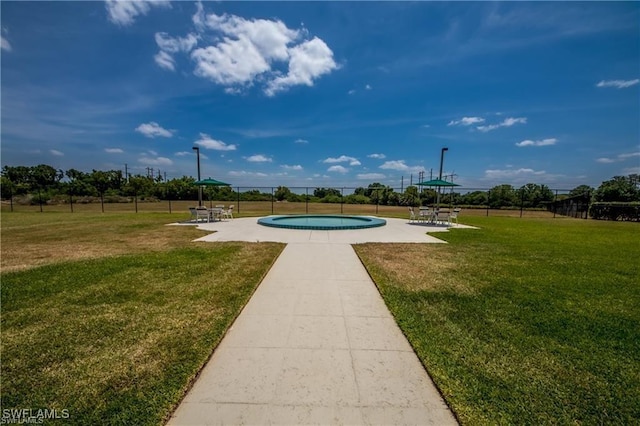 9470 Ivy Brook Run Unit 803, Fort Myers, FL 33913 - view of community with a pool and a patio area