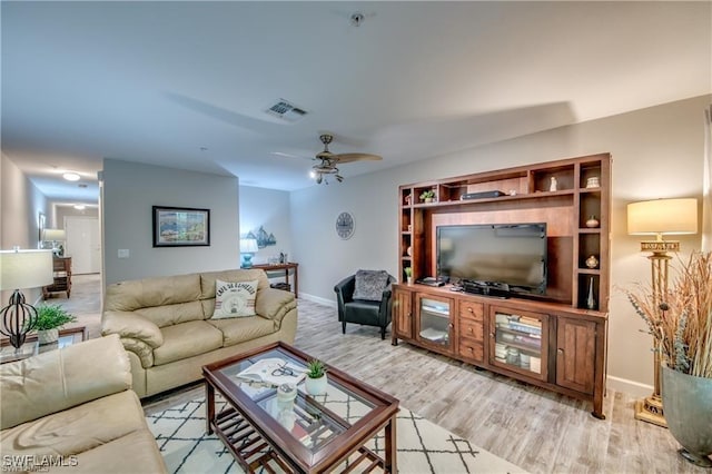 9470 Ivy Brook Run Unit 803, Fort Myers, FL 33913 - living area featuring light wood-style floors and a ceiling fan