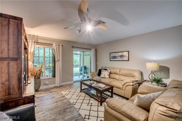 9470 Ivy Brook Run Unit 803, Fort Myers, FL 33913 - living area featuring a ceiling fan and light wood finished floors