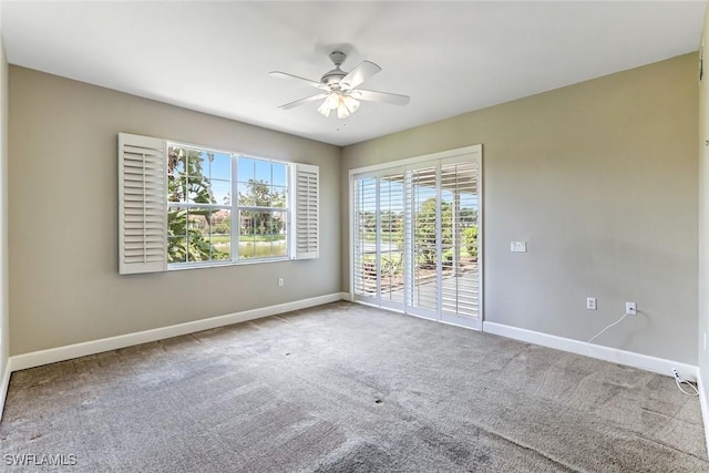 3082 Windsong Ct Unit 303, Naples, FL 34109 - carpeted spare room with a ceiling fan and baseboards