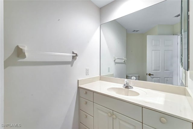 3082 Windsong Ct Unit 303, Naples, FL 34109 - bathroom with vanity and toilet