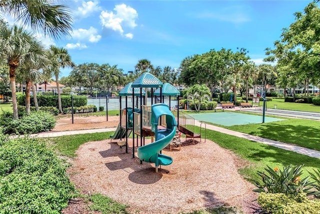 3082 Windsong Ct Unit 303, Naples, FL 34109 - community jungle gym featuring a yard