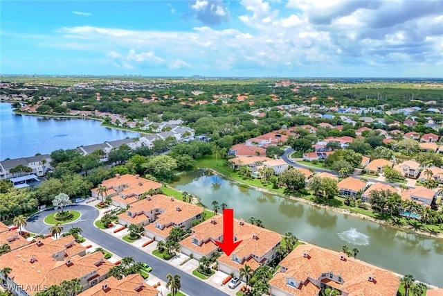 3082 Windsong Ct Unit 303, Naples, FL 34109 - aerial view of residential area featuring a large body of water