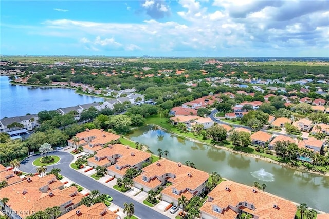 3082 Windsong Ct Unit 303, Naples, FL 34109 - aerial view of residential area featuring a large body of water