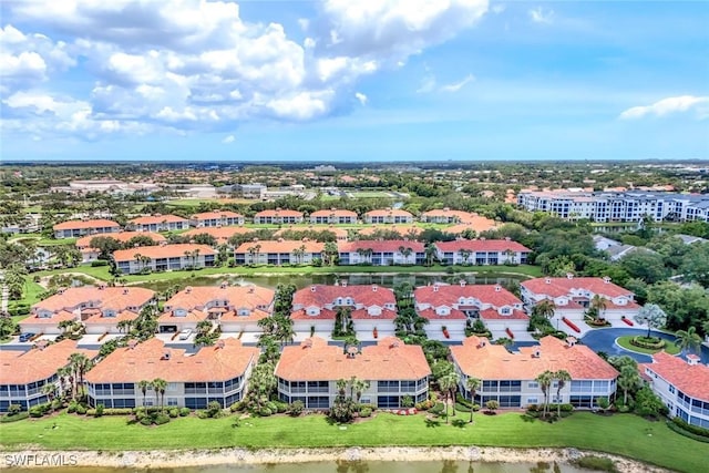 3082 Windsong Ct Unit 303, Naples, FL 34109 - drone / aerial view of a nearby body of water
