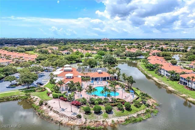 3082 Windsong Ct Unit 303, Naples, FL 34109 - aerial view of a pool area and a nearby body of water