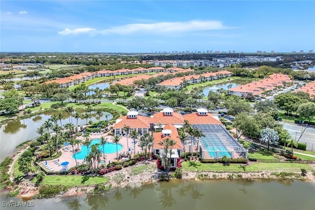 3082 Windsong Ct Unit 303, Naples, FL 34109 - view of urban area with a large body of water and a pool
