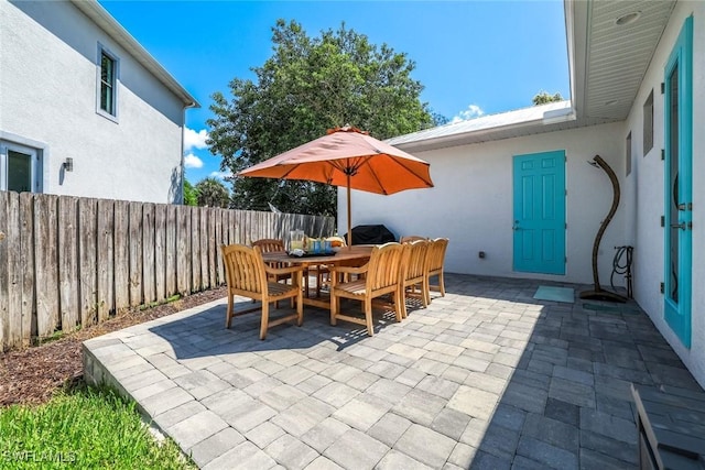 3980 Full Moon Ct, Naples, FL 34112 - view of patio / terrace with outdoor dining space