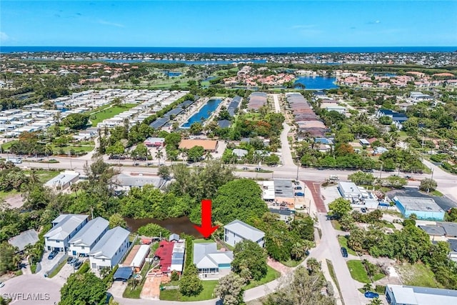 3980 Full Moon Ct, Naples, FL 34112 - aerial view of property and surrounding area with a nearby body of water and nearby suburban area